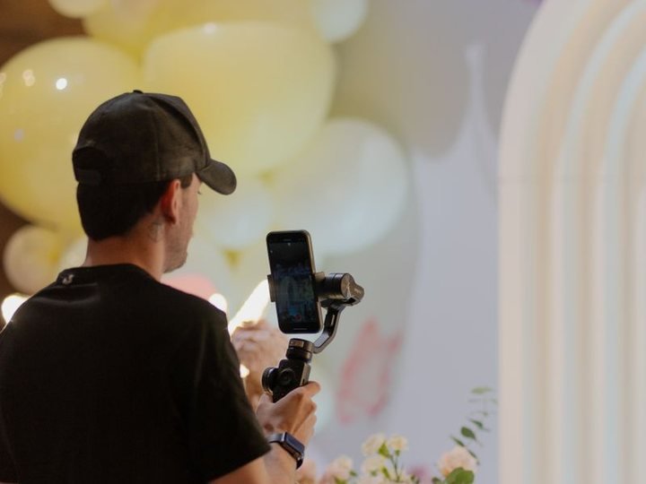 Somebody filming an event setup